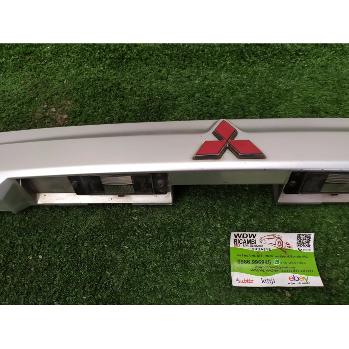 MR245529 RIVESTIMENTO PORTELLONE POSTERIORE LUCE TARGA MITSUBISHI SPACE STAR
